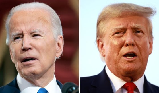 At left, President Joe Biden speaks at the U.S Capitol in Washington on Jan. 6, 2022. At right, former President Donald Trump speaks to the media at Atlanta Hartsfield-Jackson International Airport after being booked at the Fulton County jail in Atlanta on Aug. 24.