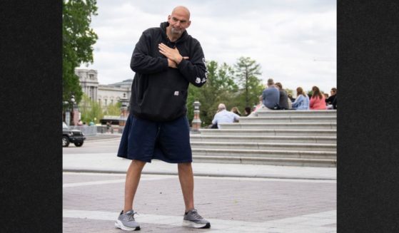Pennsylvania Democratic Sen. John Fetterman is seen arriving at the Capitol in Washington, D.C,.wearing his customary attire of gym shorts and a hooded sweatshirt.