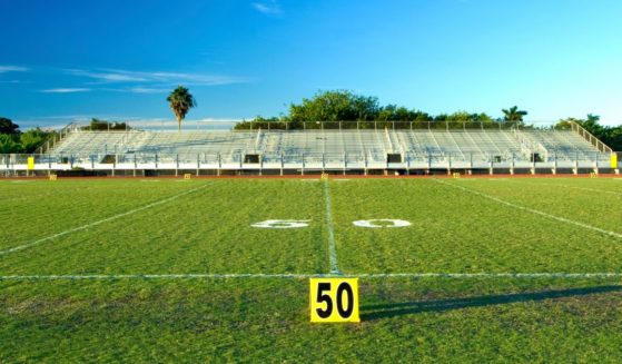 A fifty yard marker is pictured on a football field. On Friday, a fight ended in gunfire during a high school game in Port Allen, Louisiana, leaving one student dead.