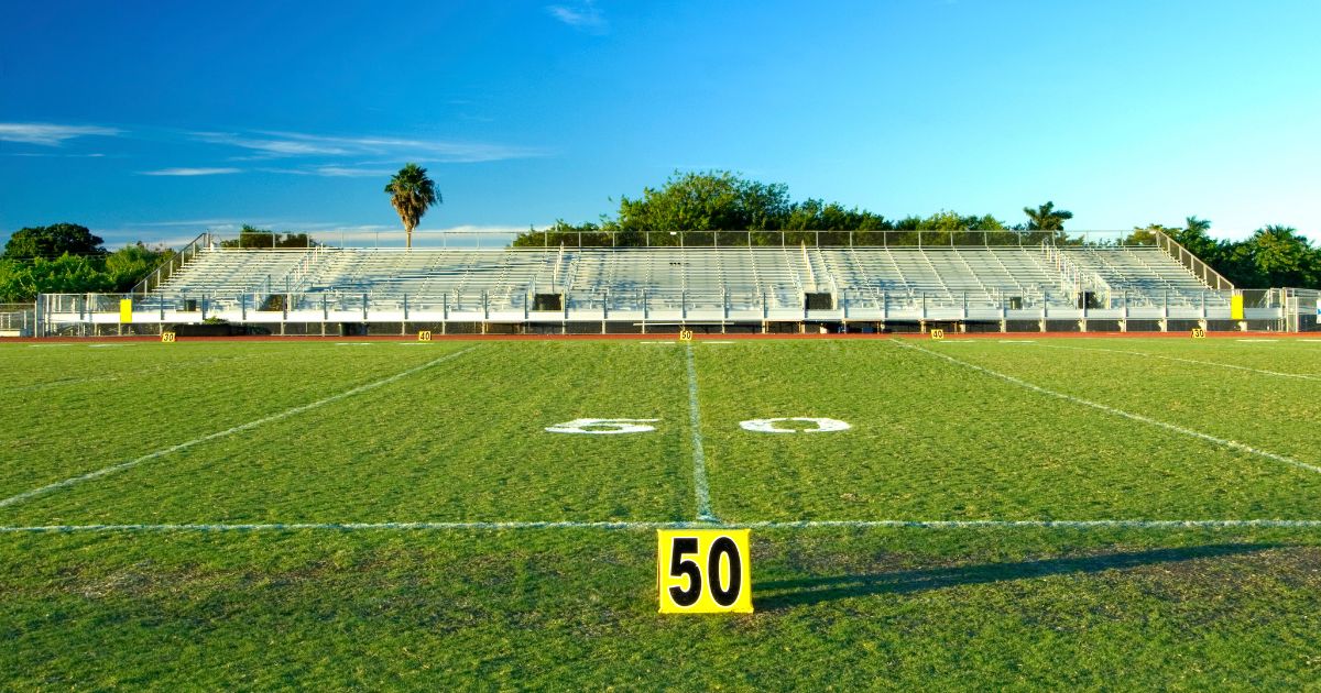 A fifty yard marker is pictured on a football field. On Friday, a fight ended in gunfire during a high school game in Port Allen, Louisiana, leaving one student dead.