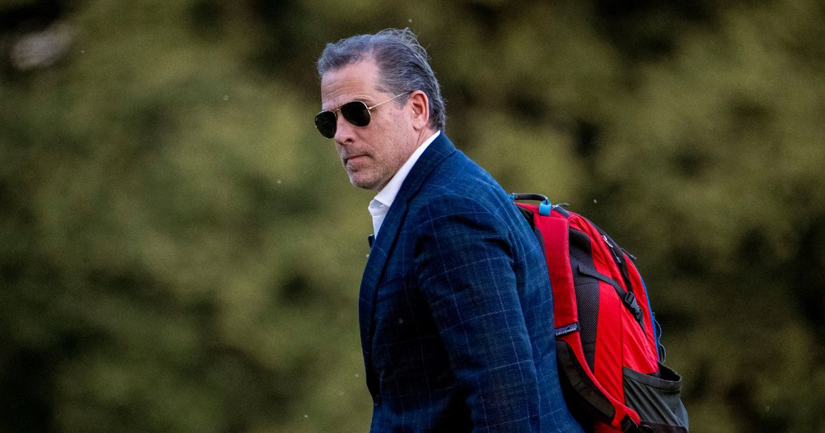Hunter Biden walking from Marine One upon arrival at Fort McNair