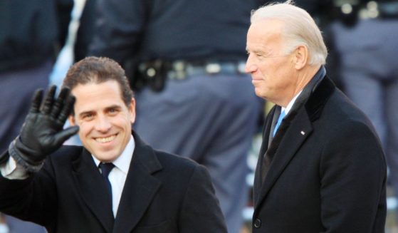 Hunter Biden, left, waves to the crowd at the parade after his father Joe Biden, right, was sworn in as vice president in 2009.