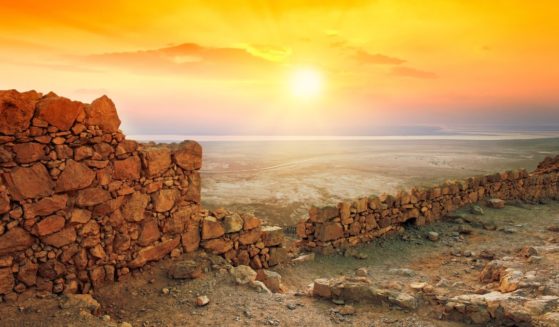 The sun rises over the Judean desert in this stock image.