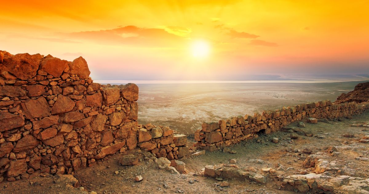 The sun rises over the Judean desert in this stock image.