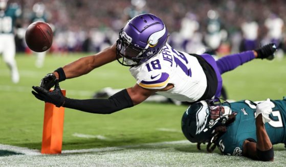 Justin Jefferson of the Minnesota Vikings dives for the pylon during his team's game against the Philadelphia Eagles at Lincoln Financial Field on Thursday night.