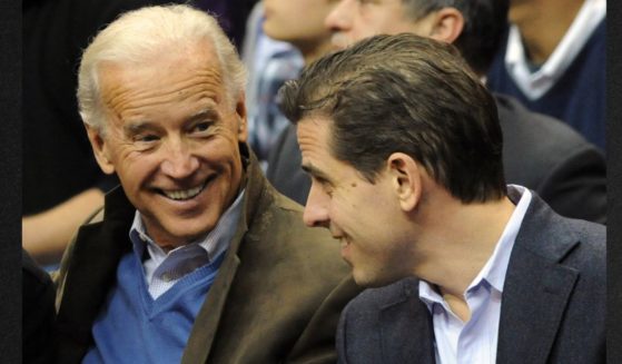 Then-Vice President Joe Biden, left, and his son Hunter Biden are seen attending a basketball game in a file photo from January 2010.