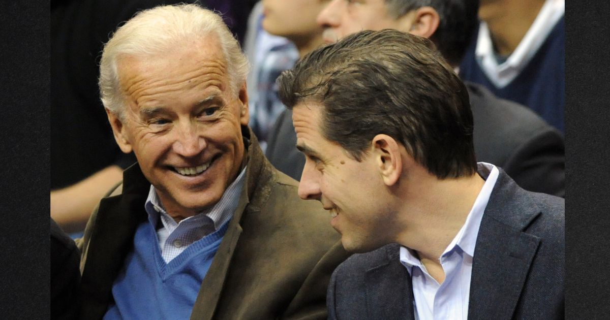 Then-Vice President Joe Biden, left, and his son Hunter Biden are seen attending a basketball game in a file photo from January 2010.