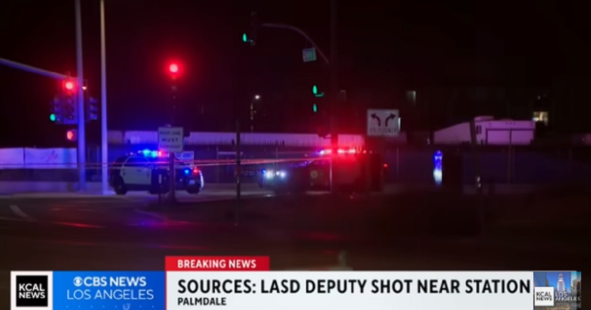 Law enforcement responds to the scene Saturday of the shooting of a Los Angeles County sheriff's deputy.