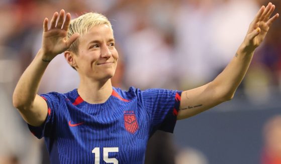 Megan Rapinoe waves to fans as she leaves the field after her final game with the United States women's soccer team, which was played against South Africa in Chicago, Illinois, on Sunday.
