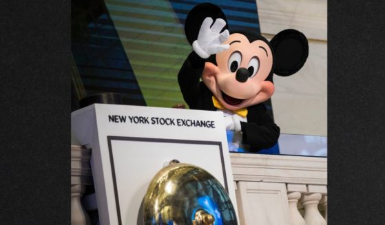 Mickey Mouse, the mascot of The Walt Disney Company, waves before ringing the opening bell at the New York Stock Exchange in a file photo from November 2017.