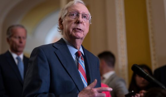 Senate Minority Leader Mitch McConnell returns to his press conference in the Capitol after he froze at the microphones and became disoriented on July 26.