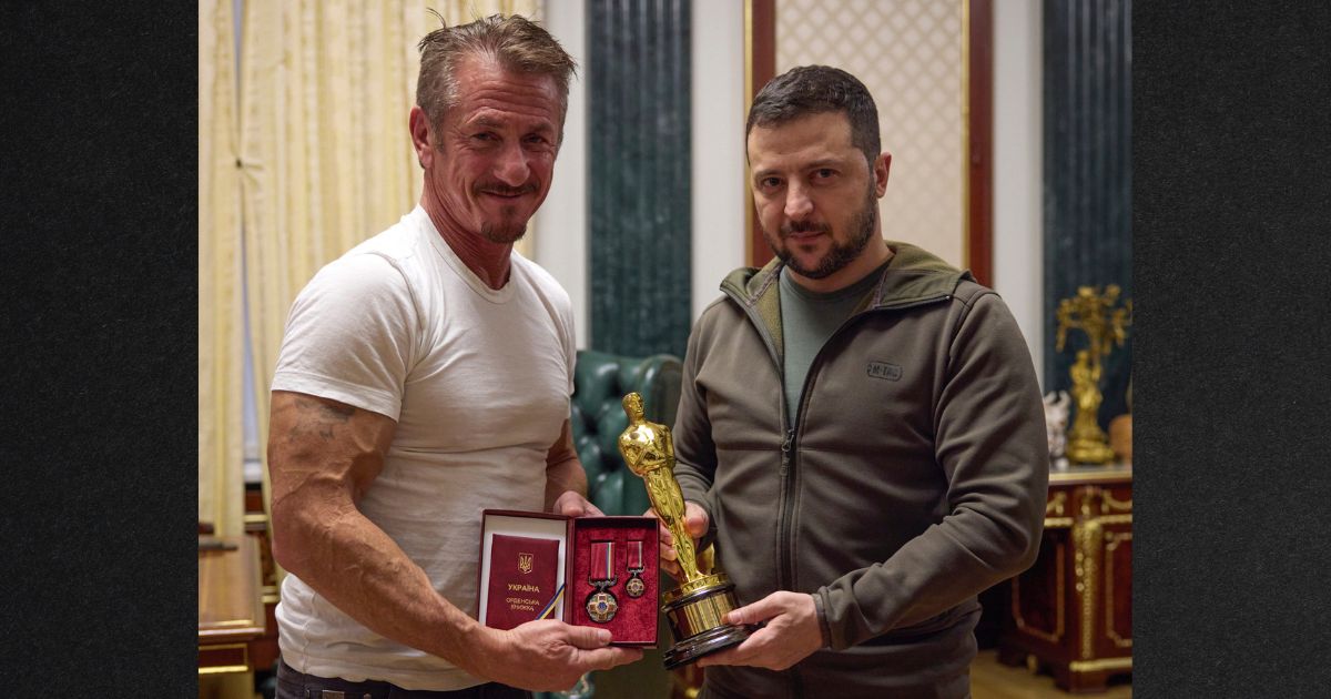 Ukrainian President Volodymyr Zelenskyy, right, poses with U.S. actor Sean Penn after receiving latter's Oscar statuette and handing him the Order of Merit, III degree during their meeting in Kyiv, Ukraine, on Nov. 8, 2022.