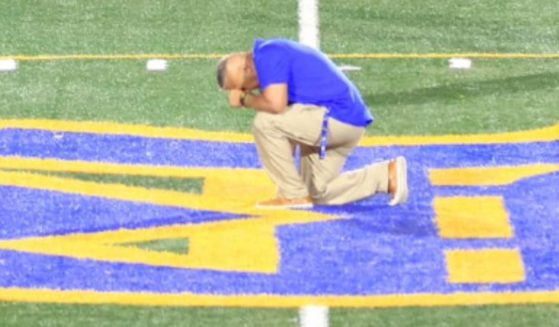 Coach Joe Kennedy said he told God 'thank you' about 30 times in his prayer at last week's Bremerton High School football game. After an 8-year battle that ended at the Supreme Court, Kennedy was reinstated to his assistant coaching job with the district, but he announced his resignation Wednesday after one game.