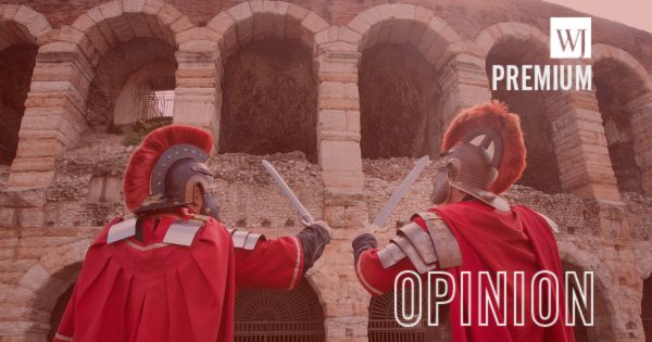 Men dressed as gladiators pose for tourists in Rome.
