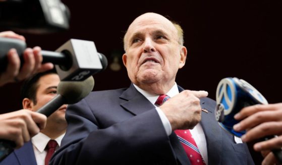 Former Mayor Rudy Giuliani speaking to reporters