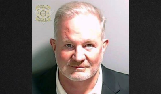 This booking photo provided by the Fulton County Sheriff's Office shows Scott Hall on Tuesday, Aug. 22. The bail bondsman, was allowed to plead guilty to five misdemeanors in exchange for testifying in proceedings against other defendants in the case that also involves former President Donald Trump.