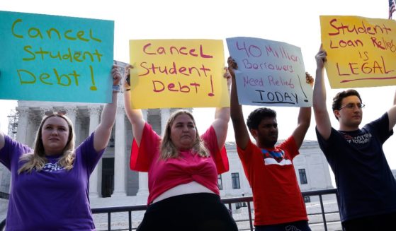 Student loan borrowers demand President Biden use "Plan B" to cancel student debt Immediately at a rally outside of the Supreme Court in Washington, D.C., on June 30.