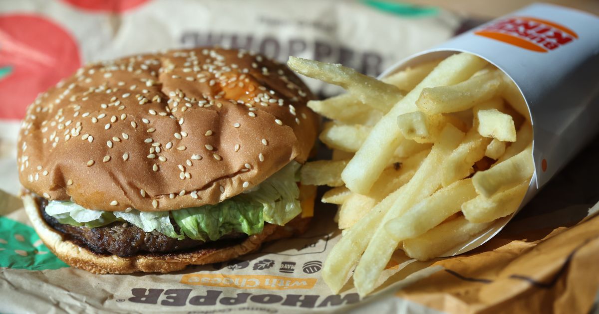 A Burger King Whopper pictured with a side of french fries in San Anselmo, California, on April 5, 2022.