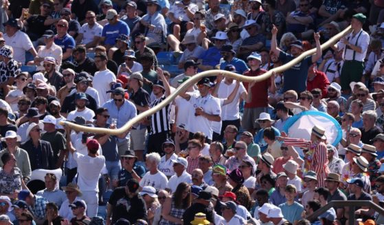 A beer snake makes it way through the cricket fans in the Western Terrace during Day Two of the LV= Insurance Ashes 3rd Test Match between England and Australia at Headingley on July 7, 2023 in Leeds, England.
