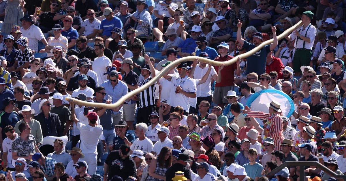 A beer snake makes it way through the cricket fans in the Western Terrace during Day Two of the LV= Insurance Ashes 3rd Test Match between England and Australia at Headingley on July 7, 2023 in Leeds, England.