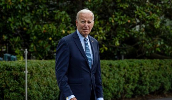 President Joe Biden walks out of the White House as he prepares to board Marine One on the south lawn on Sunday in Washington, D.C.
