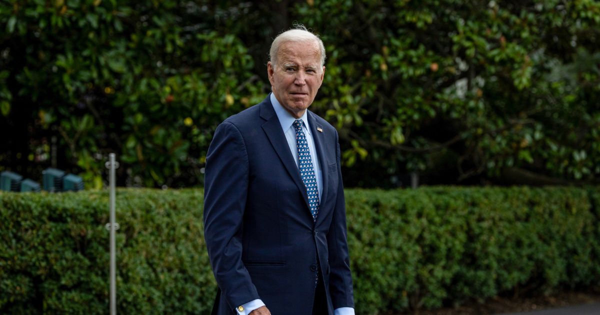 President Joe Biden walks out of the White House as he prepares to board Marine One on the south lawn on Sunday in Washington, D.C.