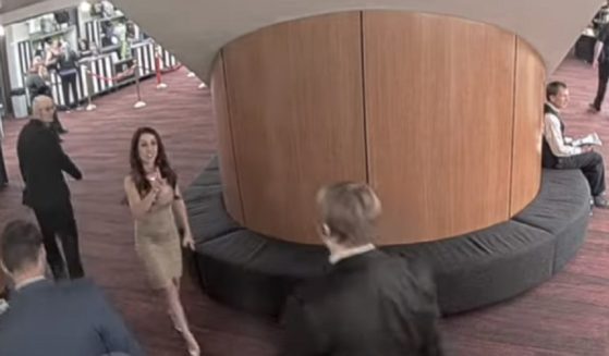 U.S. Rep. Lauren Boebert in a scene from a video being escorted out of a Denver theater for misbehavior on Sunday.
