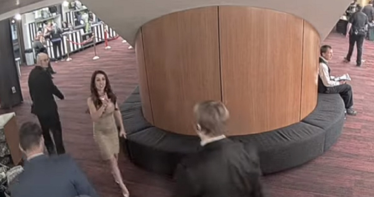 U.S. Rep. Lauren Boebert in a scene from a video being escorted out of a Denver theater for misbehavior on Sunday.