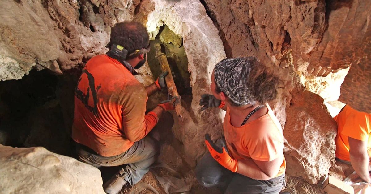 Israeli archaeologists discovered four ancient swords and a shafted weapon in a cave in the Judean desert.