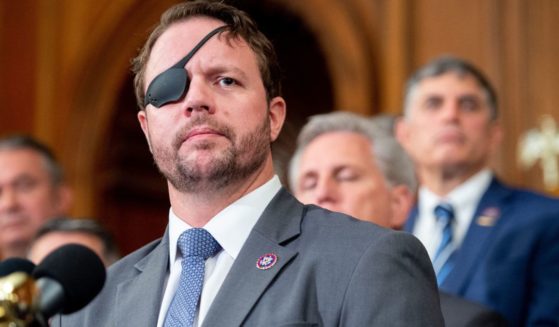 Rep. Dan Crenshaw speaks alongside fellow Republicans about the US military withdrawal from Afghanistan, criticizing President Joe Biden's actions, during a press conference at the US Capitol in Washington, D.C. Aug. 31, 2021.