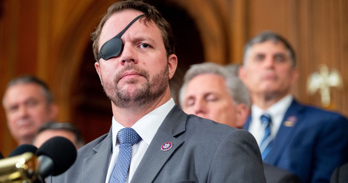 Rep. Dan Crenshaw speaks alongside fellow Republicans about the US military withdrawal from Afghanistan, criticizing President Joe Biden's actions, during a press conference at the US Capitol in Washington, D.C. Aug. 31, 2021.