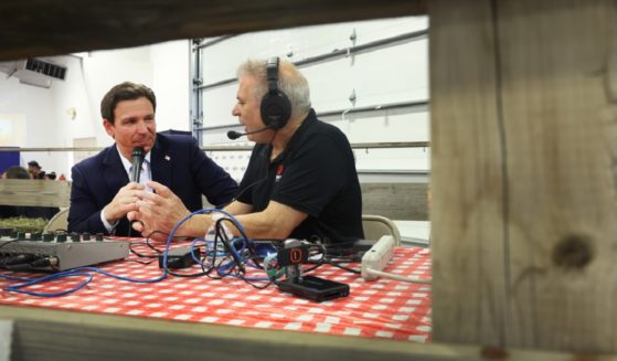 Florida Gov. Ron DeSantis is pictured in a file photo from an Aug. 6 interview at Ashley's BBQ Bash hosted by Republican Rep. Ashley Hinson in Cedar Rapids, Iowa.