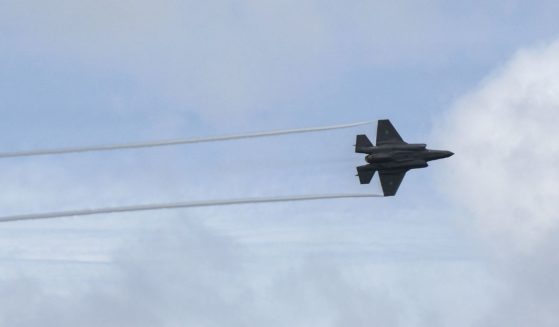 An Australian F-35A lightning fighter jet flies past during a joint exercise between Australian and Philippine troops at a naval base in San Antonio town, Zambales province on Aug. 25.