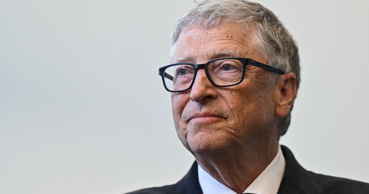 Microsoft founder Bill Gates reacts during a visit with Britain's Prime Minister Rishi Sunak to the Imperial College University on Feb. 15 in London.