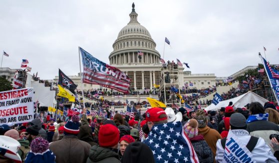 Crowds gather outside the Capitol on Jan. 6, 2021, to protest the certification of the 2020 election results that gave the presidency to Joe Biden.