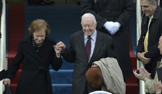 Former president Jimmy Carter and his wife, Rosalynn, are pictured in a Jan. 20, 2017, file photo attending the inauguration of former President Donald Trump.