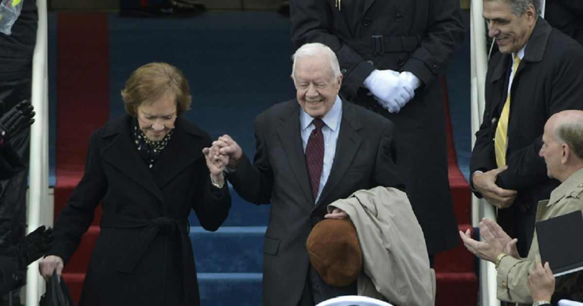 Former president Jimmy Carter and his wife, Rosalynn, are pictured in a Jan. 20, 2017, file photo attending the inauguration of former President Donald Trump.
