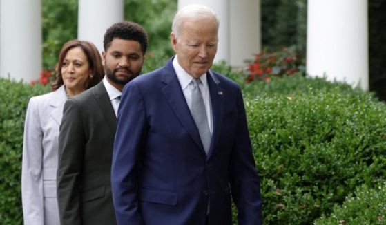 President Joe Biden, pictured Friday in the White House Rose Garden with Rep. Maxwell Frost, a Florida Democrat, and Vice President Kamala Harris.