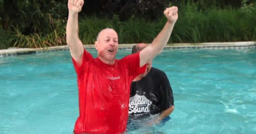 Hall of Fame football player Jim Kelly was baptized.
