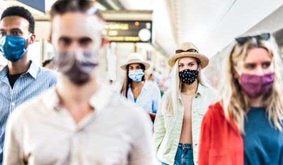 The above stock image is of people wearing masks.