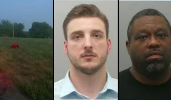 Northwoods, Missouri, police officers Samuel Davis, center, and Michael Hill, right, are facing charges after a man they allegedly arrested was found beaten in a field on July 4.
