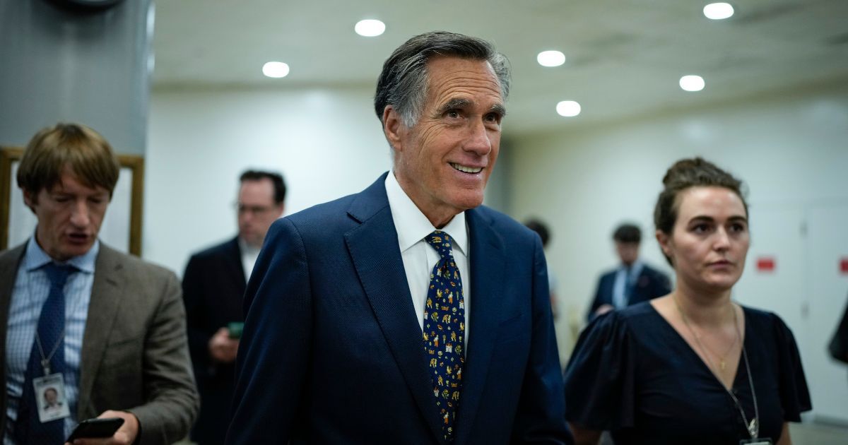 Sen. Mitt Romney walks through the Senate subway at the U.S. Capitol in Washington, D.C., on Monday. Romney announced on Wednesday that he will not seek re-election in 2024.