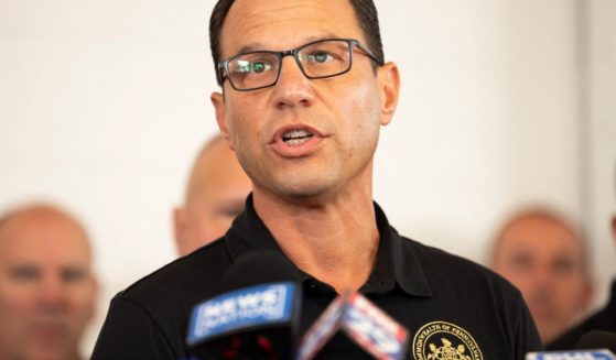 Pennsylvania Governor Josh Shapiro speaks to the media at a press conference held at the Po-Mar-Lin Fire Company in Unionville, Pennsylvania, on Sept. 13.