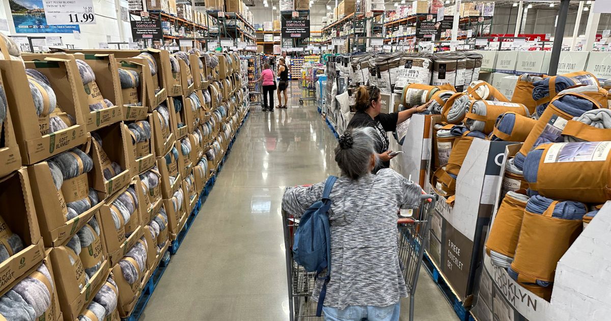 Shoppers in a Costco warehouse