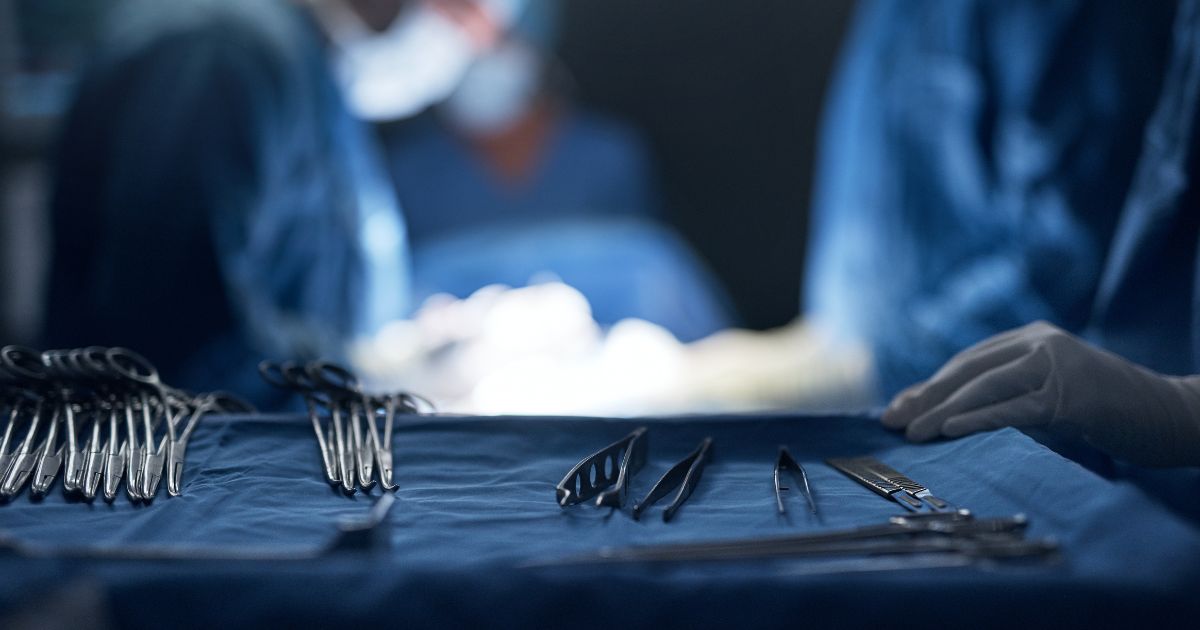 This stock image shows a tray of surgical equipment.