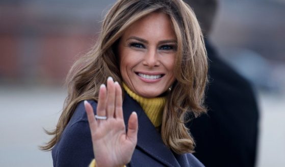 Then-first lady Melania Trump boards a plane at Andrews Air Force Base for a three state overnight trip March 4, 2019 in Maryland.