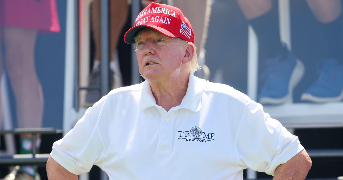 Former President Donald Trump looks on at hole one prior to the start of day three of the LIV Golf Invitational - Bedminster at Trump National Golf Club on Aug. 13 in Bedminster, New Jersey.