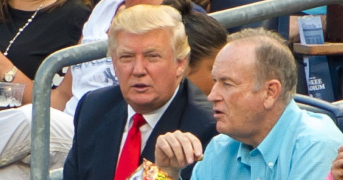 Donald Trump (L) and Bill O'Reilly attend the Baltimore Orioles vs New York Yankees game at Yankee Stadium on July 30, 2012 in New York City.