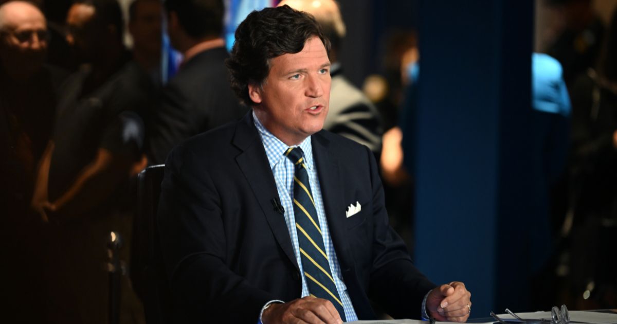 Tucker Carlson speaks during 2022 FOX Nation Patriot Awards in Hollywood, Florida, on Nov. 17, 2022. Carlson recently gave the behind the scenes story of how he landed the Trump interview on X.