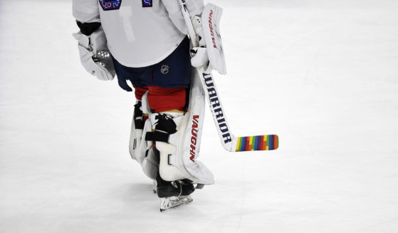 Florida Panthers goaltender Alex Lyon warms up with a colorful hockey stick during "pride" night before playing the Toronto Maple Leafs in Sunrise, Florida, on March 23. Last week the NHL sent memos to teams informing them of protocols for themed celebrations for the upcoming season, including the banning of "pride" tape during "pride" nights.